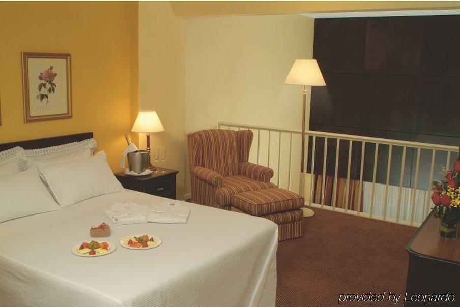 Hotel Deville Curitiba Rum bild